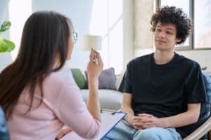 man speaking to therapist to see if he is a high functioning alcoholic